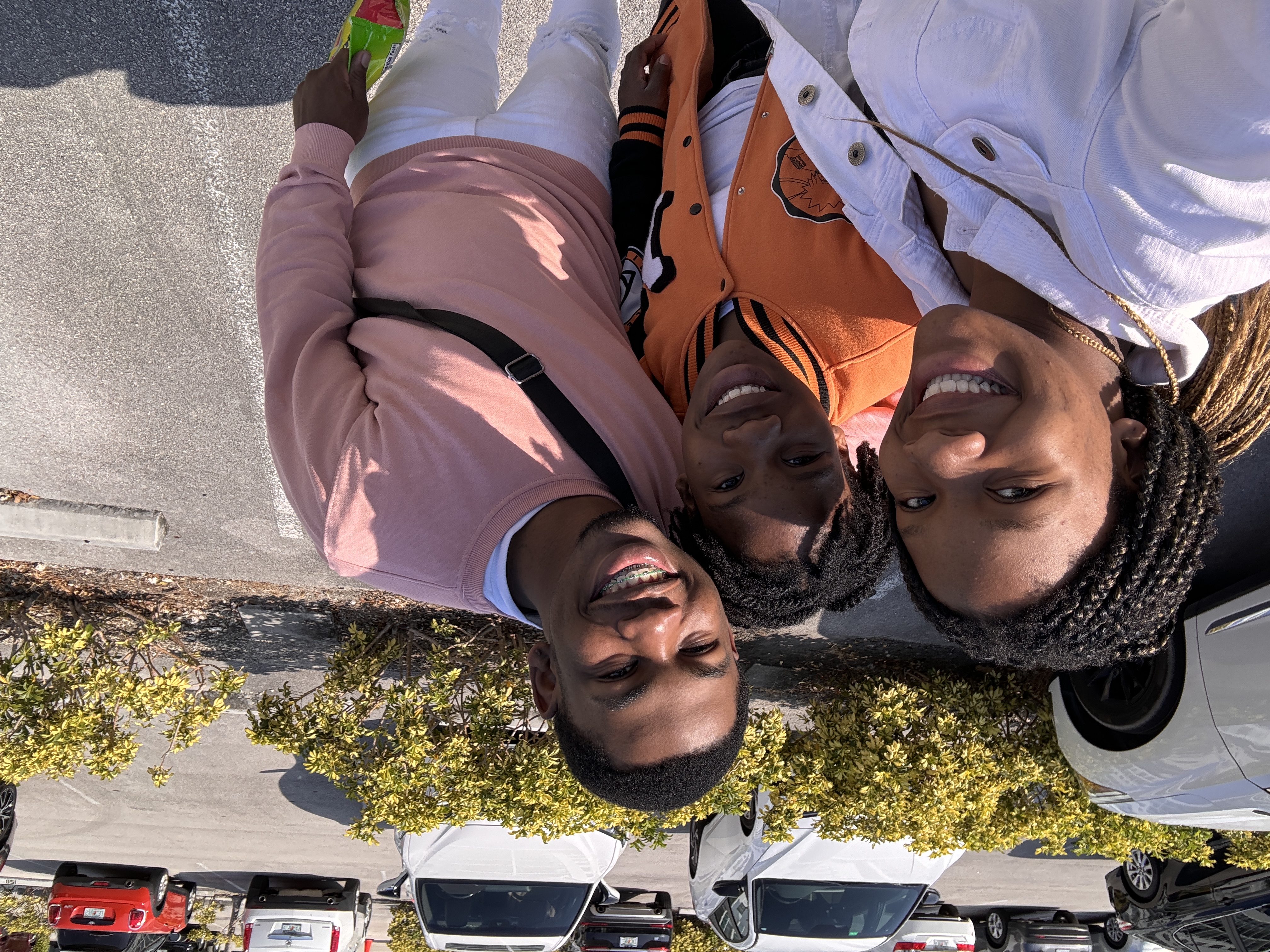 Nick and his sisters together